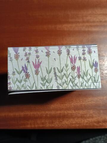 Side view of post-it block depicting illustrations of lavender plants