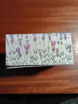 Side view of post-it block depicting illustrations of lavender plants